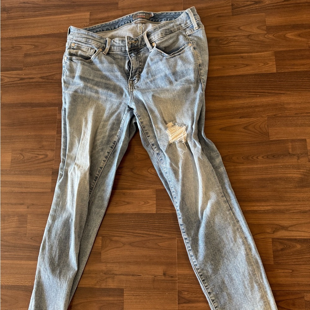 Torrid Blue Skinny Jeans with Distressed Knee